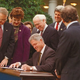 President Clinton signs the Americans With No Abilities Act into law.